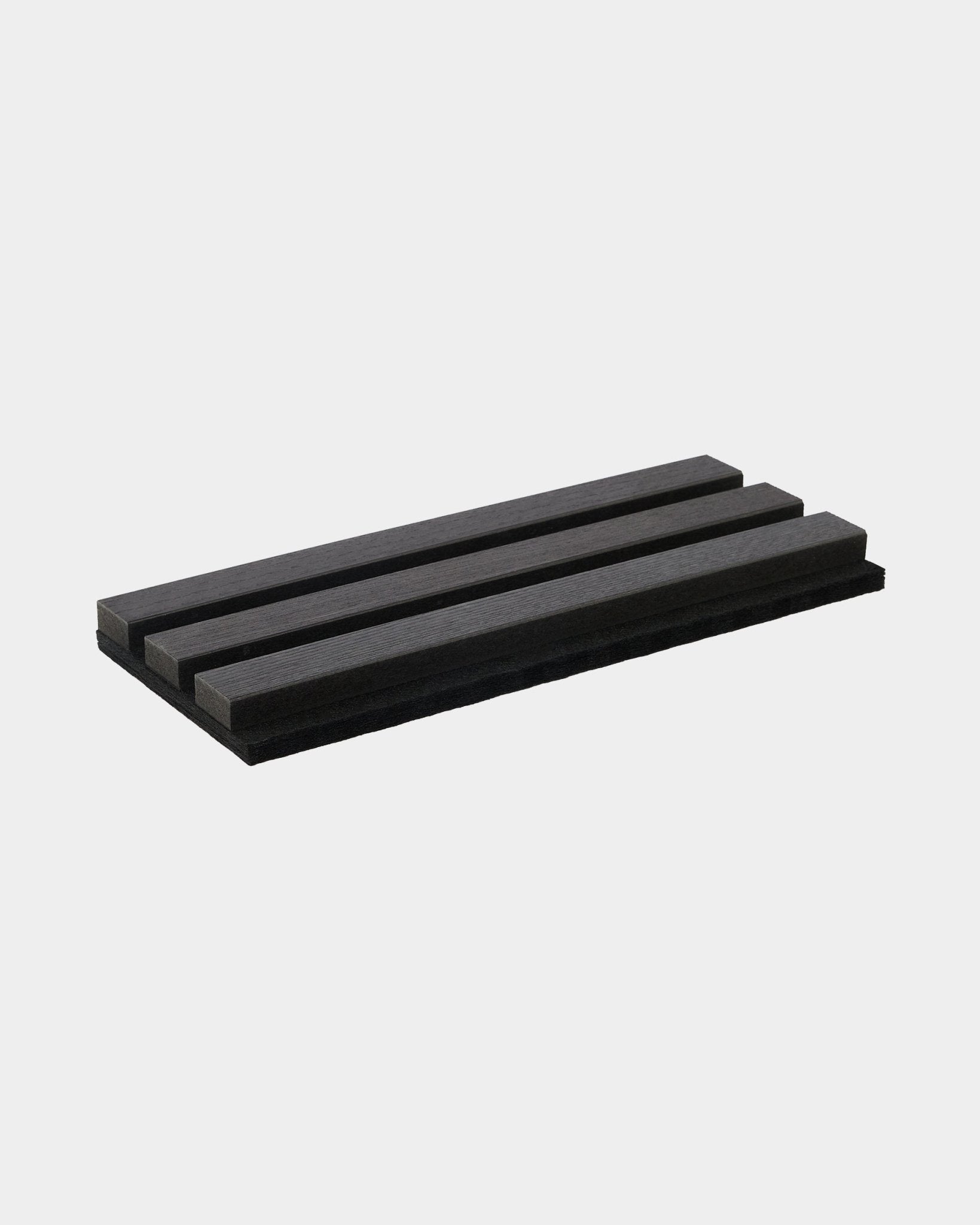 WoodUpp Tonal sample in Black Ash, a black accessory tray featuring three angled grooves, shown against a plain white background.
